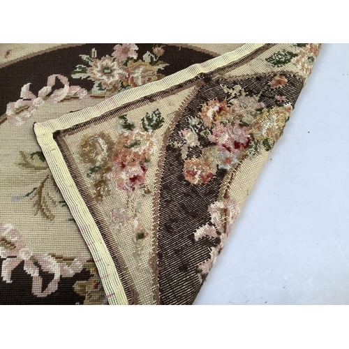 37B - An Aubusson style tapestry panel in cream, rose and dark brown, 59.5cm x 89.5cm