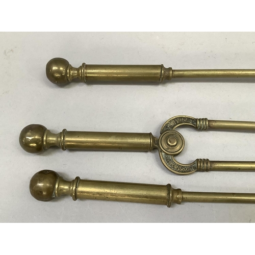 37B - A set of three Victorian brass fire irons