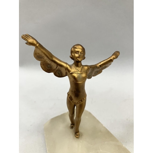 18 - A gilt metal mounted alabaster ashtray in the form of a dancer, 12.5cm long x 8cm wide x 13.5cm high