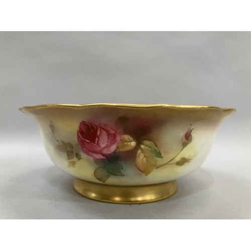 22 - A Royal Worcester rose painted bowl highlighted in gilt, printed mark with date cypher for 1916, 19.... 