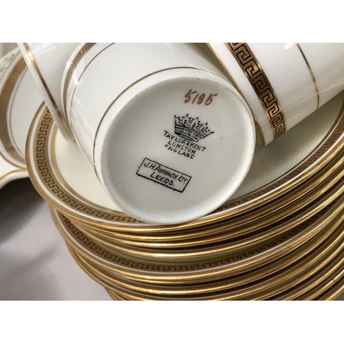 44 - A large quantity of gilt and black on white tea ware of various designs together with a triple hors ... 