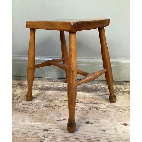 54 - A stained beech stool together with an Italian three legged sewing table, triangular form with box s... 