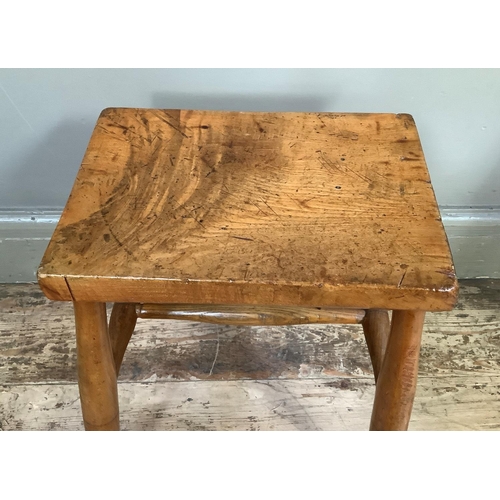 54 - A stained beech stool together with an Italian three legged sewing table, triangular form with box s... 