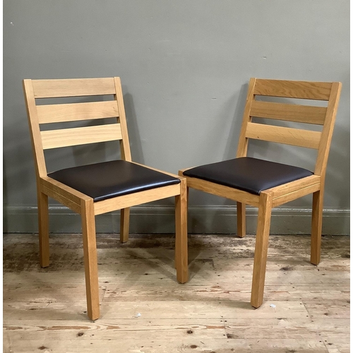 57 - A modern pine circular dining table on vase turned pedestal and four downswept legs, 105cm diameter,... 