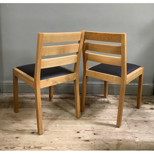 57 - A modern pine circular dining table on vase turned pedestal and four downswept legs, 105cm diameter,... 