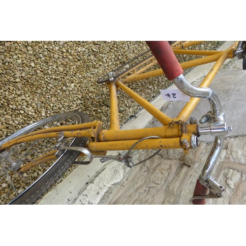 210 - A Four Seat Pacing Bicycle, yellow frame, with cranks, chain & duplex forks.

Please note we are una... 