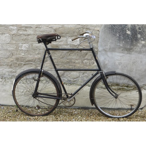 214 - A BSA Double Top Tube Gentleman's Bicycle. 31inch frame, brakes and leather saddle.

Please note we ... 