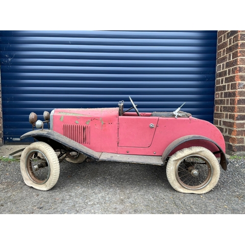 109 - Lines Bros Vauxhall Pedal Car. Ex long term storage, and mostly complete. A spare windscreen is incl... 