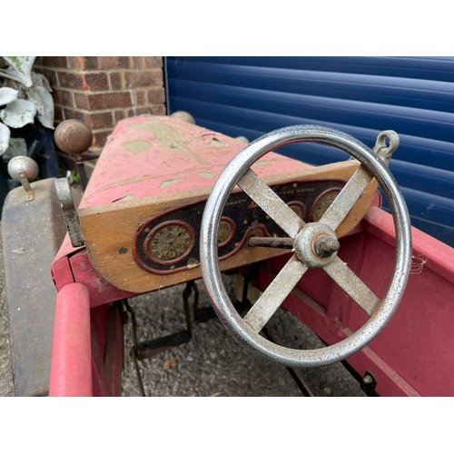109 - Lines Bros Vauxhall Pedal Car. Ex long term storage, and mostly complete. A spare windscreen is incl... 