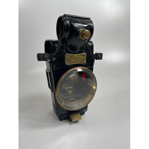 231 - Miller Hub Lamp in good complete condition, with King of the Road Badge

Please note we are unable t... 