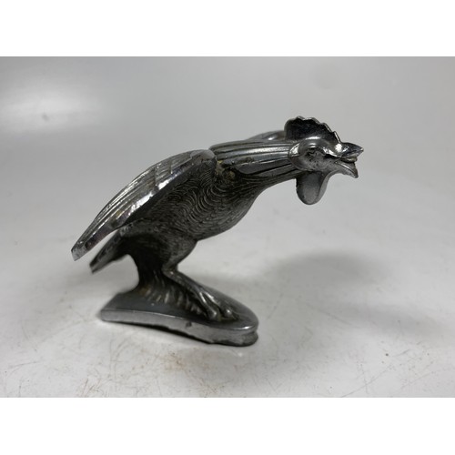 12 - A Singer Bantam vintage car mascot

This item is Category B on our Shipping Policy