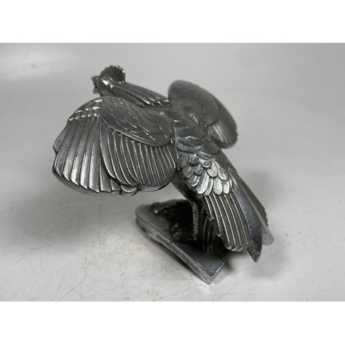 12 - A Singer Bantam vintage car mascot

This item is Category B on our Shipping Policy