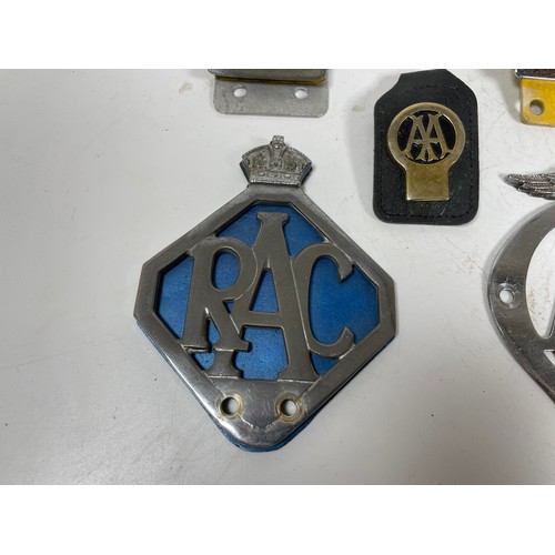 14 - A selection of AA and RAC Car Badges together with an AA Keyring

This item is category B in our Shi... 