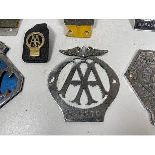 14 - A selection of AA and RAC Car Badges together with an AA Keyring

This item is category B in our Shi... 