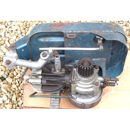 Trojan Cycle Motor. A rear wheel-mounted ‘Mini’ motor with petrol tank ...