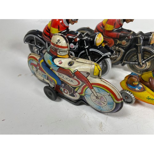 50 - Tinplate Motorcycles (5). One Monkey on a Tricycle, Policia, One Monkey with Sidecar and 2x Black Mo... 