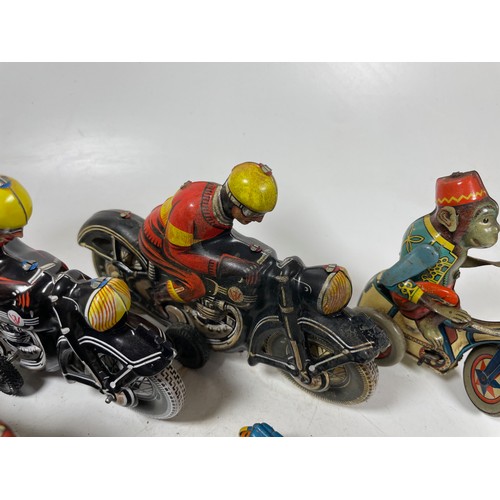 50 - Tinplate Motorcycles (5). One Monkey on a Tricycle, Policia, One Monkey with Sidecar and 2x Black Mo... 