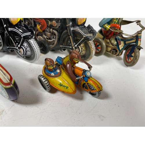 50 - Tinplate Motorcycles (5). One Monkey on a Tricycle, Policia, One Monkey with Sidecar and 2x Black Mo... 