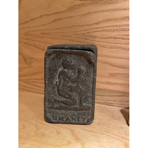 46 - Three Vintage Tins, One Cast, One Tin Moneyboy and One Biscuit Tin

Shipping Rate B