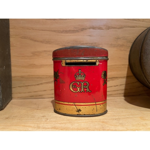 46 - Three Vintage Tins, One Cast, One Tin Moneyboy and One Biscuit Tin

Shipping Rate B