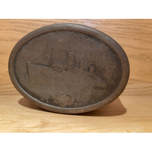 46 - Three Vintage Tins, One Cast, One Tin Moneyboy and One Biscuit Tin

Shipping Rate B