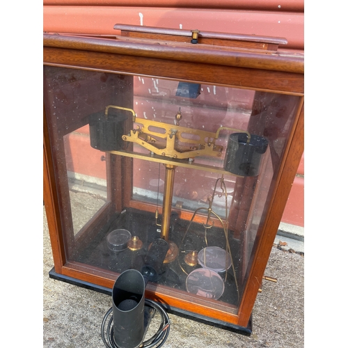 15 - 2no Laboratory Analytical Balances in Glazed Cases. One by L'Oertling & Co of London.

In House Ship... 