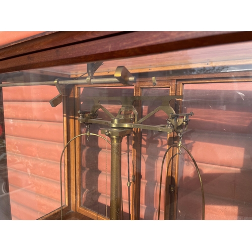 16 - A Laboratory Analytical Balance in Glazed Mahongany Cabinet t/w an Empty Cabinet

In House Shipping ... 