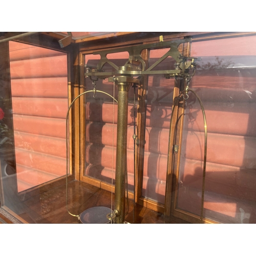 16 - A Laboratory Analytical Balance in Glazed Mahongany Cabinet t/w an Empty Cabinet

In House Shipping ... 