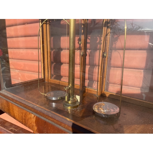 16 - A Laboratory Analytical Balance in Glazed Mahongany Cabinet t/w an Empty Cabinet

In House Shipping ... 