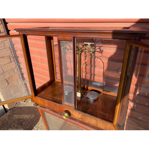 16 - A Laboratory Analytical Balance in Glazed Mahongany Cabinet t/w an Empty Cabinet

In House Shipping ... 