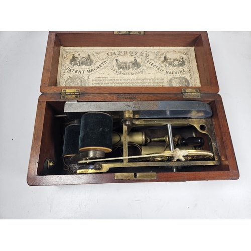 19 - Gray & Selby Improved Patent Magneto Electric Machine. In wooden case, With hand crank handle and bo... 