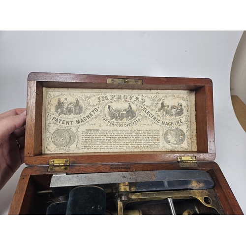 19 - Gray & Selby Improved Patent Magneto Electric Machine. In wooden case, With hand crank handle and bo... 
