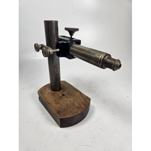20 - The Cambridge Scientific Instrument Co Ltd Lucas Patent Magnifier, No.13242 1908. On wooden base. Wa... 