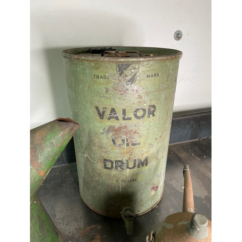 524 - 2 Oil Pourers, and 1 Oil Drum, Castrol 1 Gallon, Petrola, Valor 5 Gallon with Tap

In house shipping... 