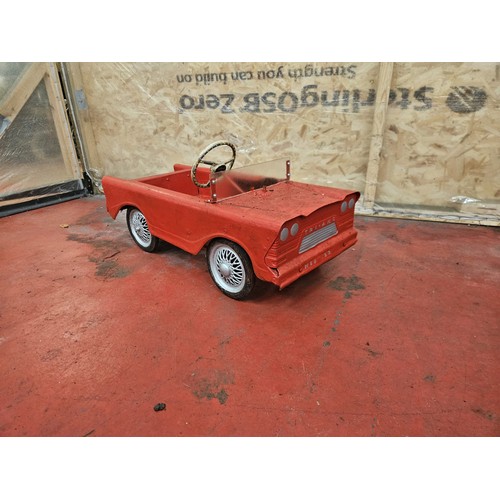 528 - Red & Silver Tri-Ang Pedal Car

In house shipping unavailable