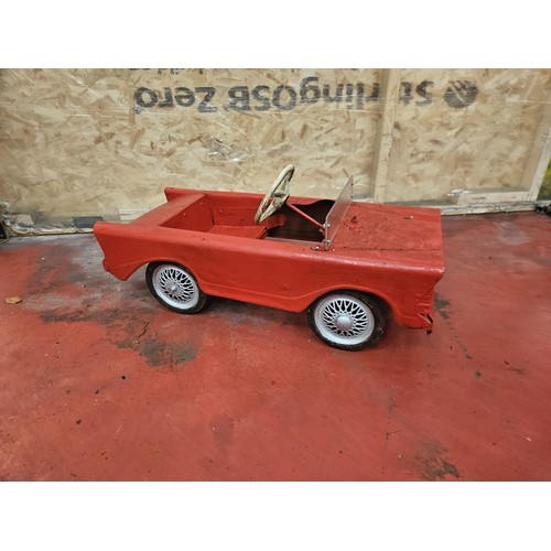 528 - Red & Silver Tri-Ang Pedal Car

In house shipping unavailable
