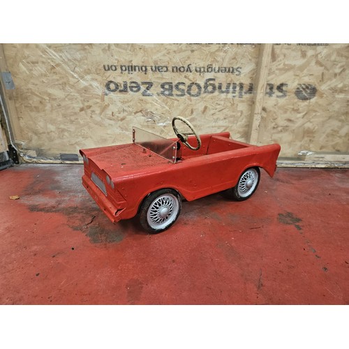 528 - Red & Silver Tri-Ang Pedal Car

In house shipping unavailable