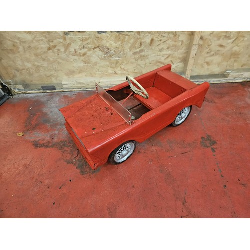 528 - Red & Silver Tri-Ang Pedal Car

In house shipping unavailable