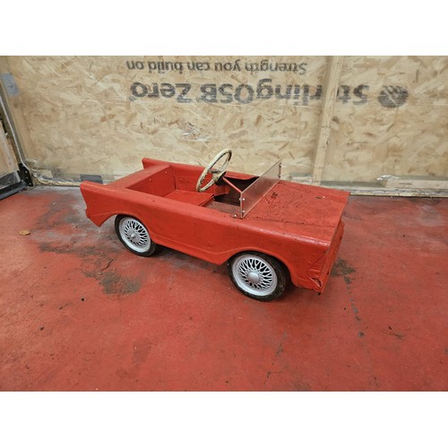 528 - Red & Silver Tri-Ang Pedal Car

In house shipping unavailable