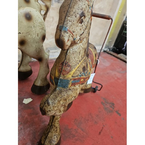 542 - Two MOBO Childrens Tinplate Horses

In house shipping unavailable