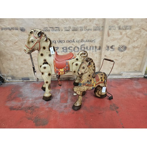 542 - Two MOBO Childrens Tinplate Horses

In house shipping unavailable