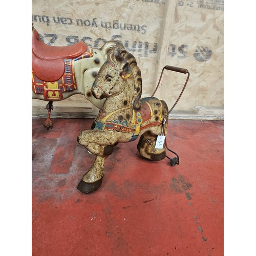 542 - Two MOBO Childrens Tinplate Horses

In house shipping unavailable