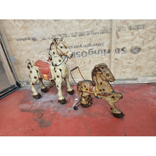542 - Two MOBO Childrens Tinplate Horses

In house shipping unavailable
