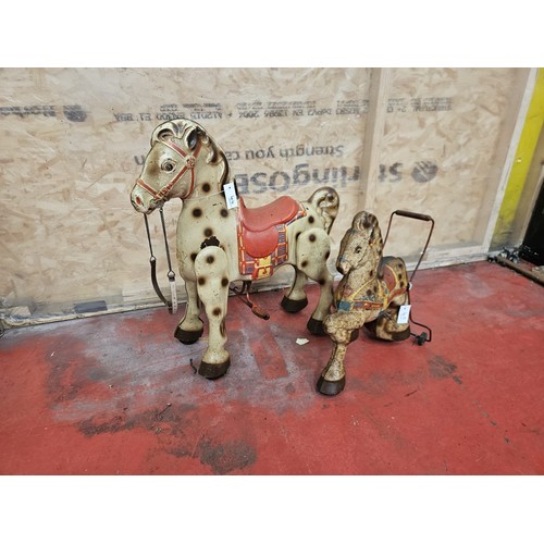 542 - Two MOBO Childrens Tinplate Horses

In house shipping unavailable