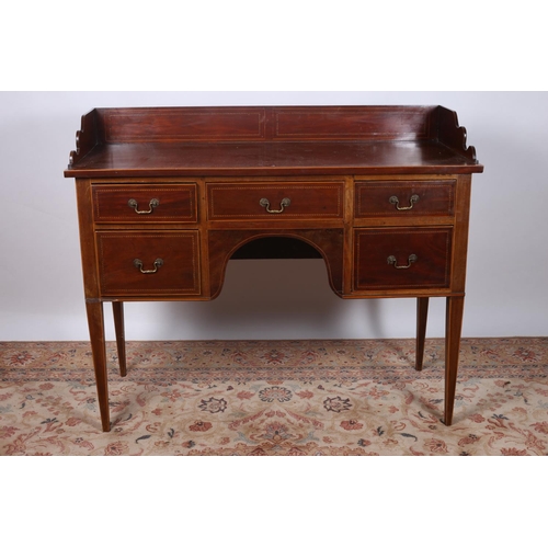 18 - A SHERATON DESIGN MAHOGANY AND SATINWOOD INLAID SIDEBOARD of rectangular outline with moulded three ... 