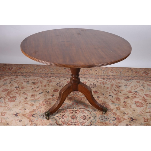 45 - A GOOD GEORGIAN MAHOGANY TABLE of circular outline with reeded rim above a baluster column on tripod... 