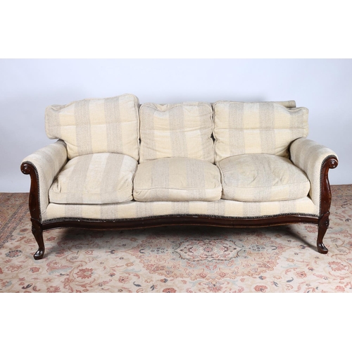 66 - A THREE PIECE MAHOGANY AND UPHOLSTERED SUITE comprising three seater settee 192(w) with loose cushio... 