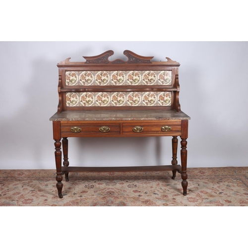 82 - AN EDWARDIAN MAHOGANY MARBLE TOP WASHSTAND the superstructure with carved cresting above a serpentin... 