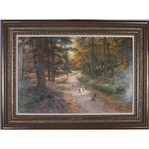 96 - JOSEPH FARQUHARSON WOODED LANDSCAPE WITH SHEEP ON A PATH Oleograph 50cm x 73cm