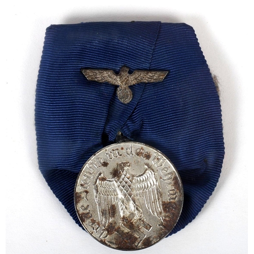 134 - 1939-45 German and Soviet medals. Eastern Front Medal, with certificate of issue (5 August 1942) to ... 